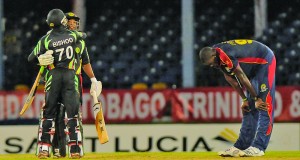 Guyana joy Holder pain! Guyana’s Devendra Bishoo and Veerasammy Permaul celebrate while Jason Holder is heartbroken (WICB Media Photo/Randy Brooks)