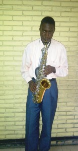 Roy serenading on his saxophone