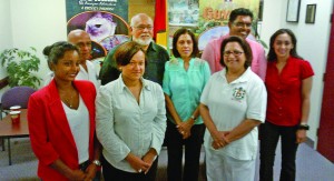 At back row: President Donald Ramotar (second left), First Lady Deolatchmie Ramotar, acting Tourism Minister Irfaan Ali and Guyana Ambassador to Canada Harrinarine Nawbatt (left) with members of the president’s delegation and officials at the Guyana Consulate in Canada   