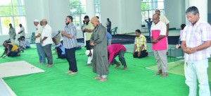 Muslims taking part in the midday prayers as part of Ramadan observances