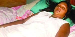 Kamlawattie “Seema” Lionel resting in bed  