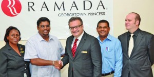  From left to right: Director of Operations, Petal Ridley; acting Tourism, Industry and Commerce Minister Irfaan Ali; Princess Hotel General Manager Cuneyt Dalcan; Guyana Tourism Authority  Director Indranauth Haralsingh; and Princess Hotel Casino General Manager Eray Kamna