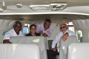 President Donald Ramotar, Prime Minister Samuel Hinds and Transport Minister Robeson Benn along with Director of JAGS Aviation, Briony Tiwari inside the new Cessna Grand Caravan