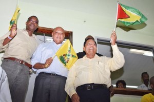 Prime Minister and President (acting) Moses Nagamootoo and Minister of Governance, Minister of Foreign Affairs (acting) Raphael Trotman and Minister of Public Infrastructure David Patterson showing their support for the team