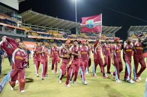 West Indies cricketers celebrate after victory in the ICC Twenty Cricket World Cup's final match between Sri Lanka and West Indies at the R. Premadasa International Cricket Stadium in Colombo on October 7, 2012. AFP PHOTO/ LAKRUWAN WANNIARACHCHI